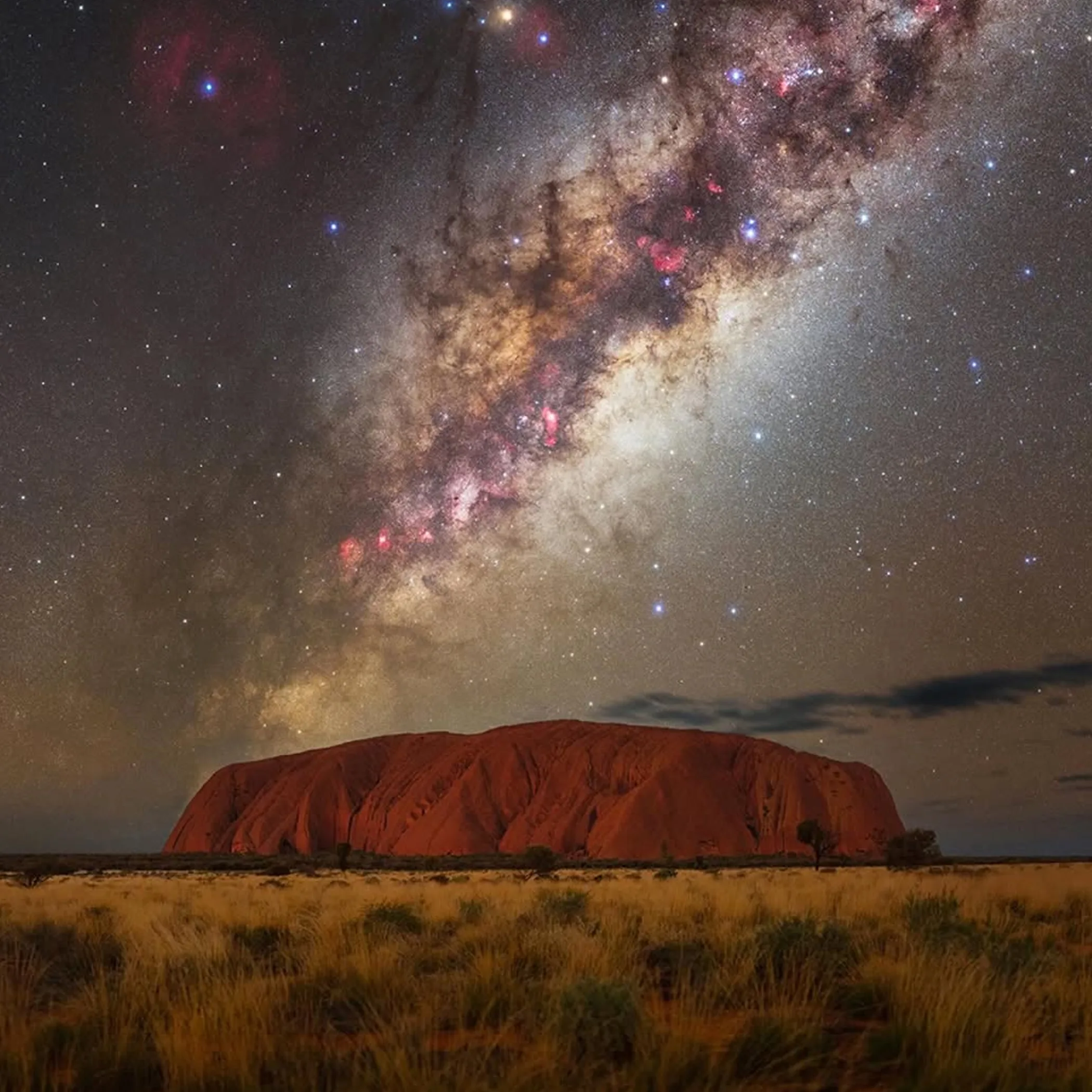 uluru under the outback night sky